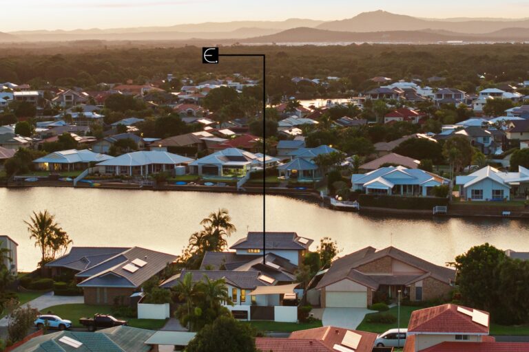 Pelican Waters canals at dusk from the air