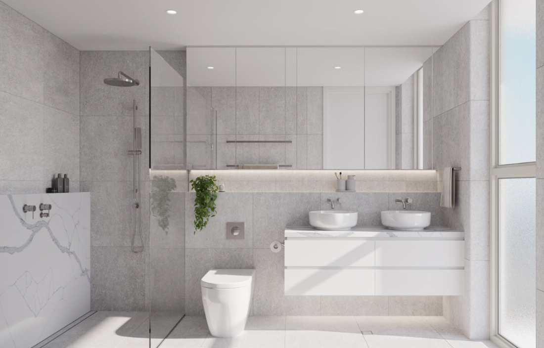 Bathroom with frameless shower screen and brushed nickel fittings