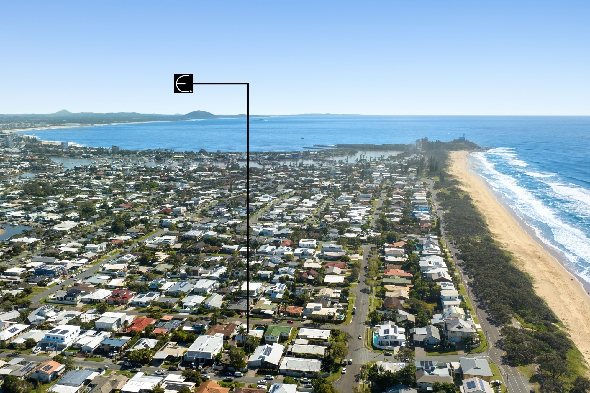 Aerial view of Buddina's beachside streets and the beach